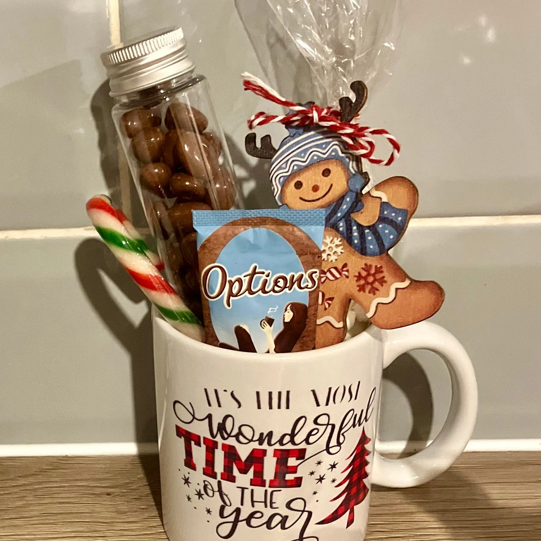 a christmas ceramic mug, hot chocolate marsh mallows, chocolate & sweets