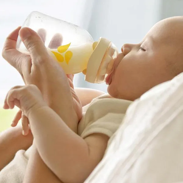 Medela Calma with bottle