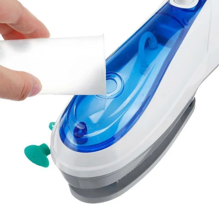 Portable hand-held clothes steamer - efficient and fast